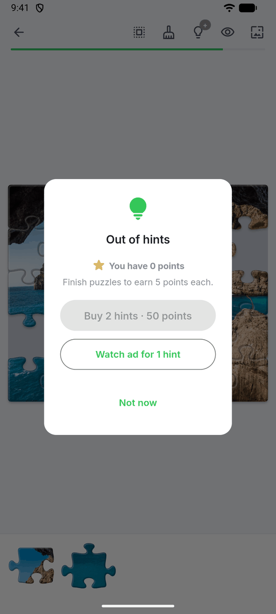Out of hints dialog with options to buy 2 hints for 50 points or watch an ad for 1 hint